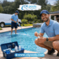 Professional pool service technicians performing detailed water testing and maintenance at a residential swimming pool