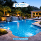 Backyard swimming pool remodel with modern design, water features, and accent lighting in a residential home